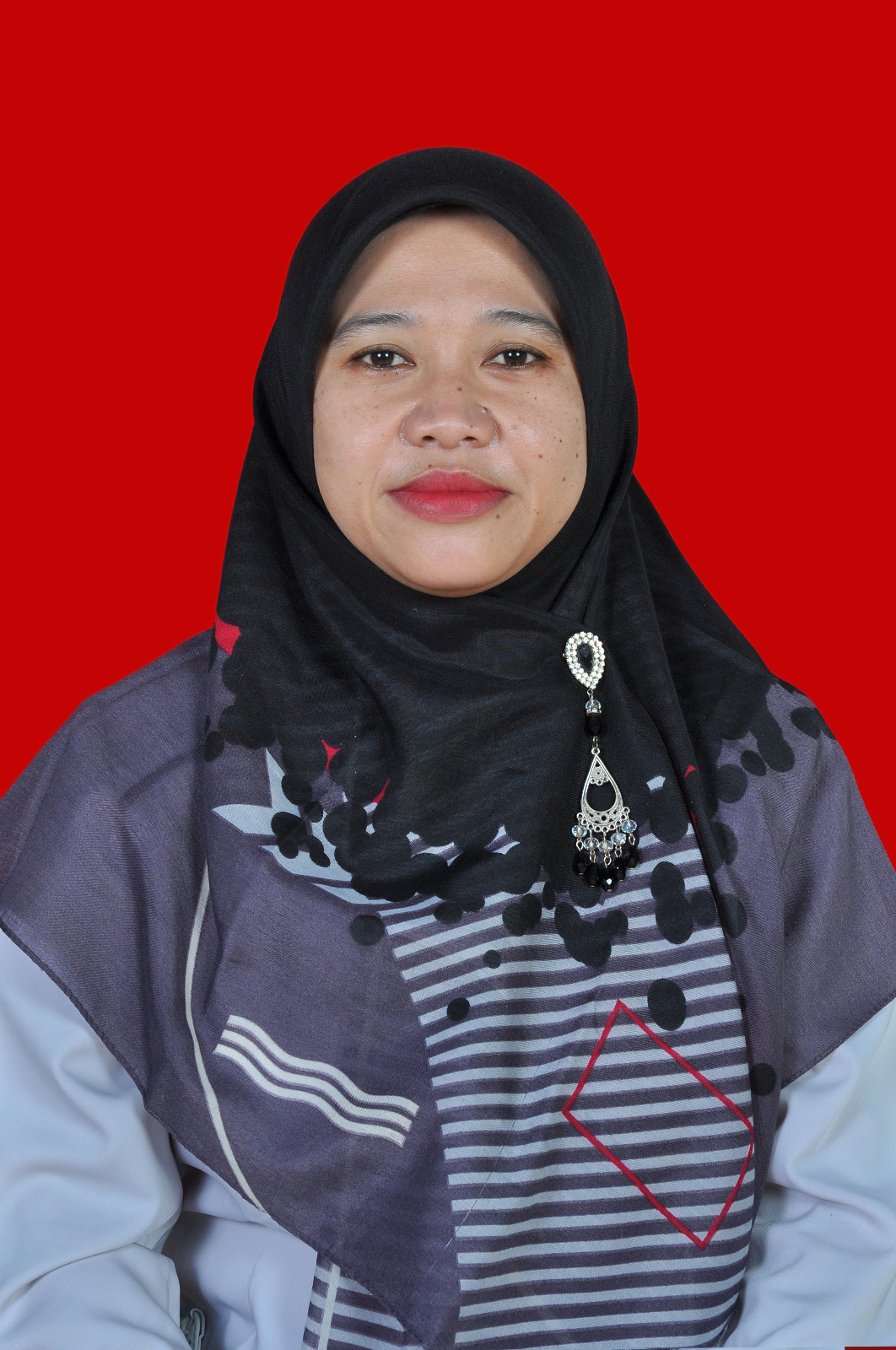 <span  class="uc_style_uc_tiles_grid_image_elementor_uc_items_attribute_title" style="color:#ffffff;">Siti Nurhidayati, S.Pd</span>